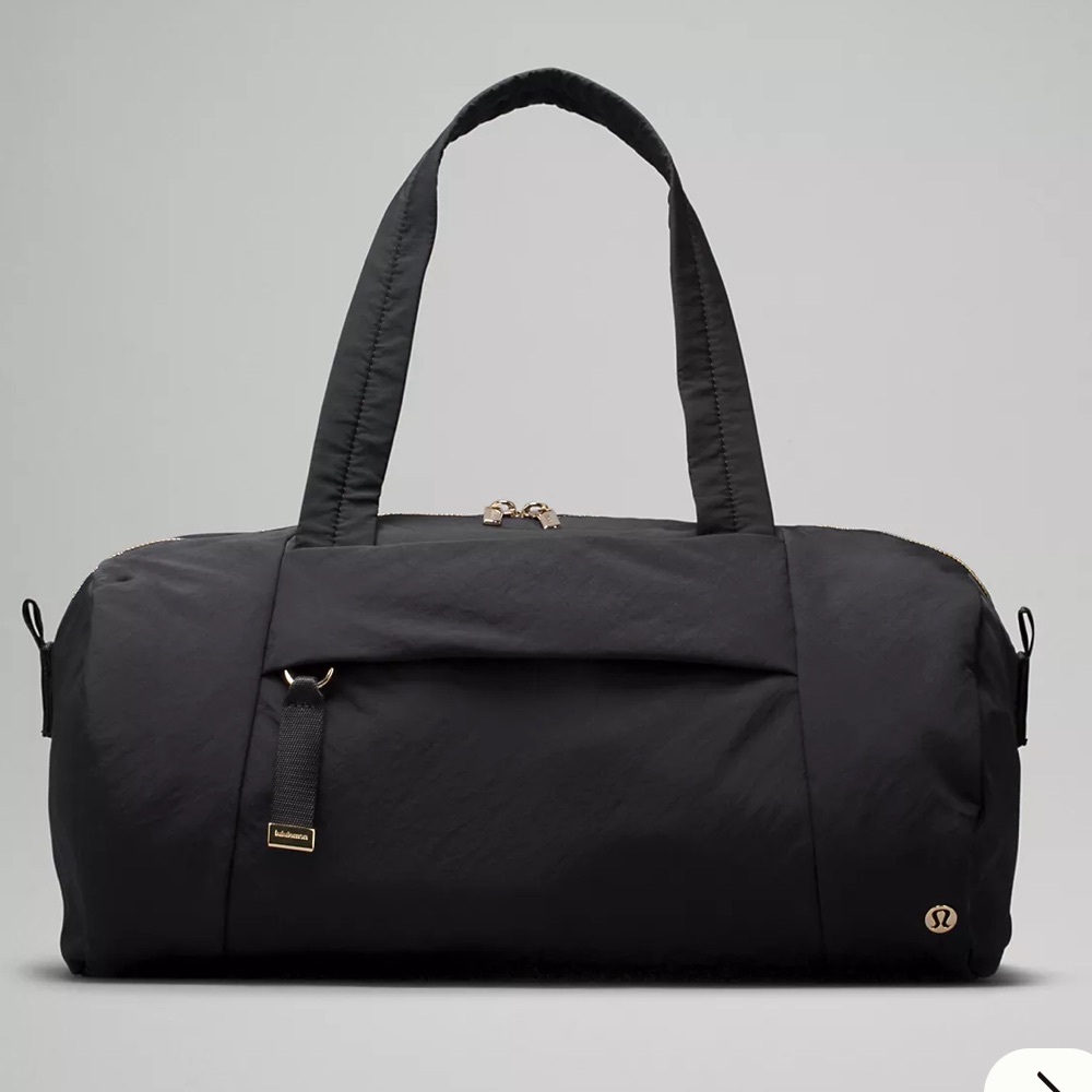 lululemon athletica Black Travel Duffel with Gold Accents